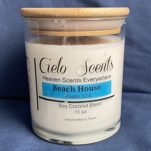 Coconut soy candle  11 oz jar with refreshing scent  called Beach House. 