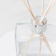 Elegant Reed Diffuser with natural bamboo reeds filled with our Beach House scent.